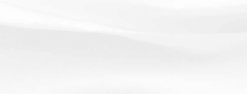 Soft, flowing white fabric texture close-up.