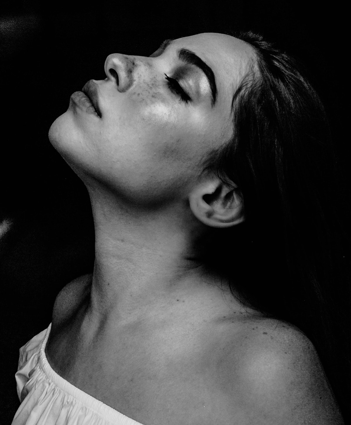 Black and white portrait of a woman.