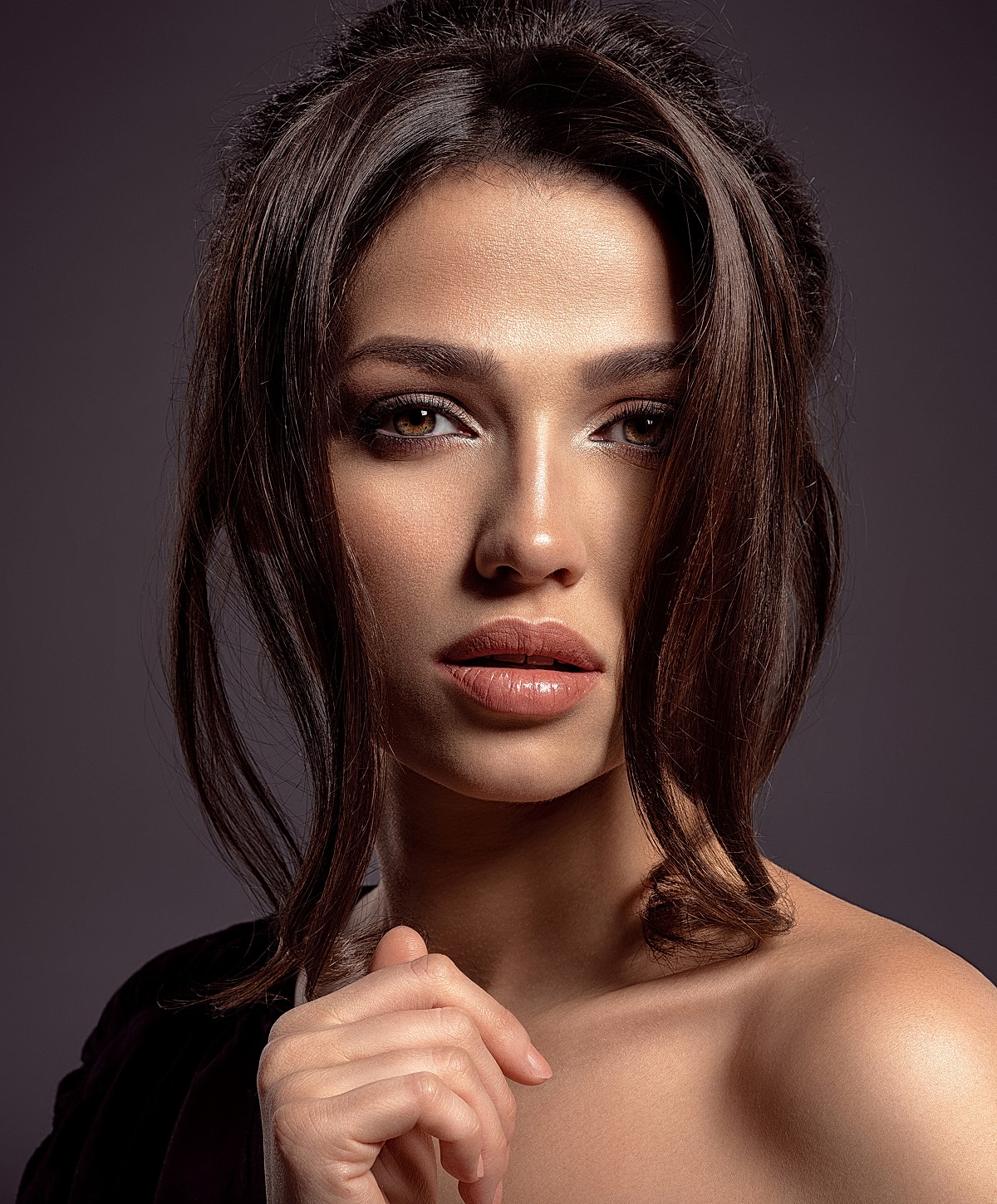 Close-up portrait of a woman with elegant features.