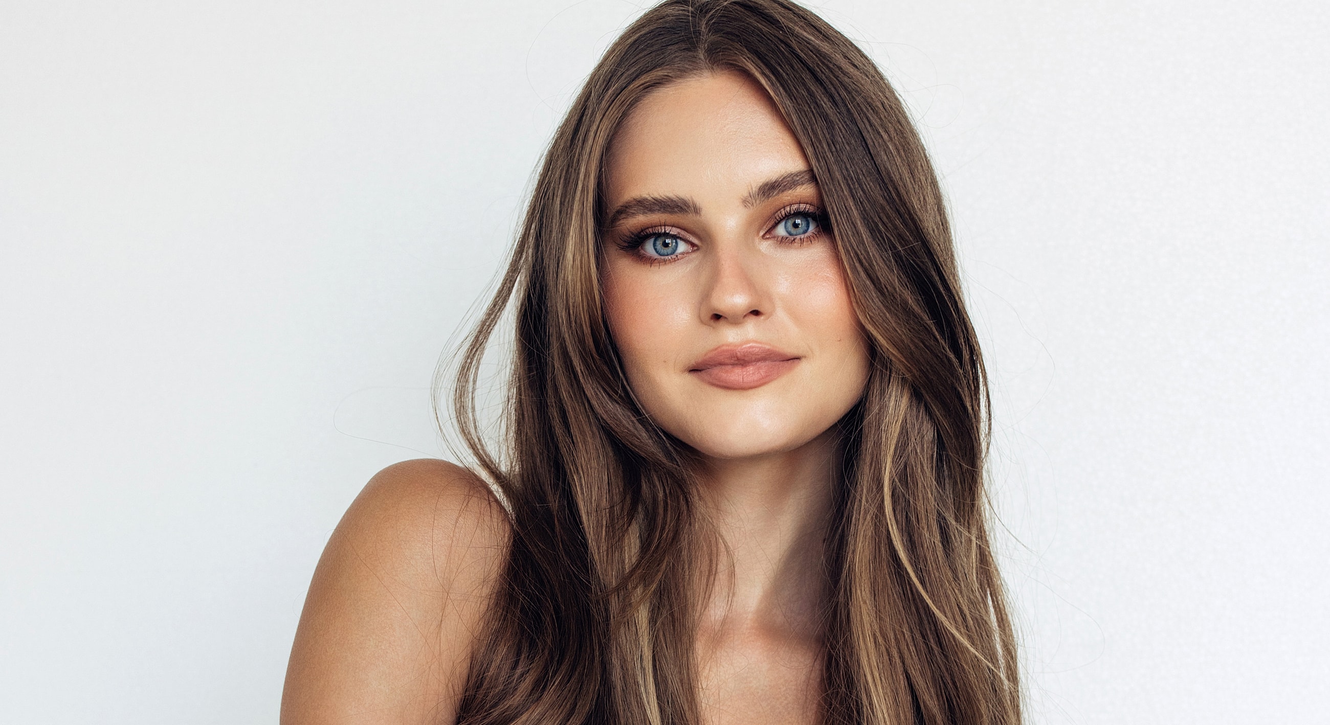 Portrait of a woman with long hair.